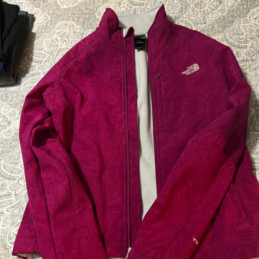 Women’s North Face soft shell jacket, size medium, pink.